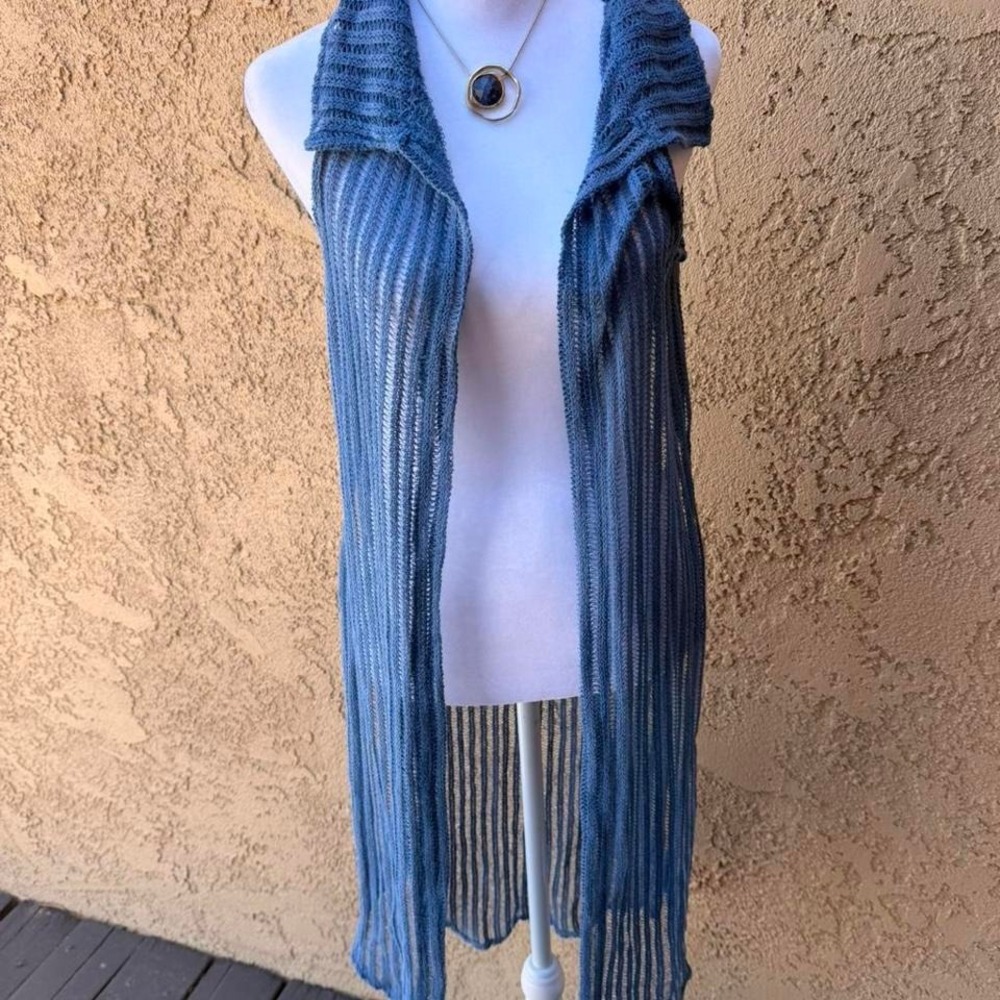 Blue knit cardigan with open front and collar.